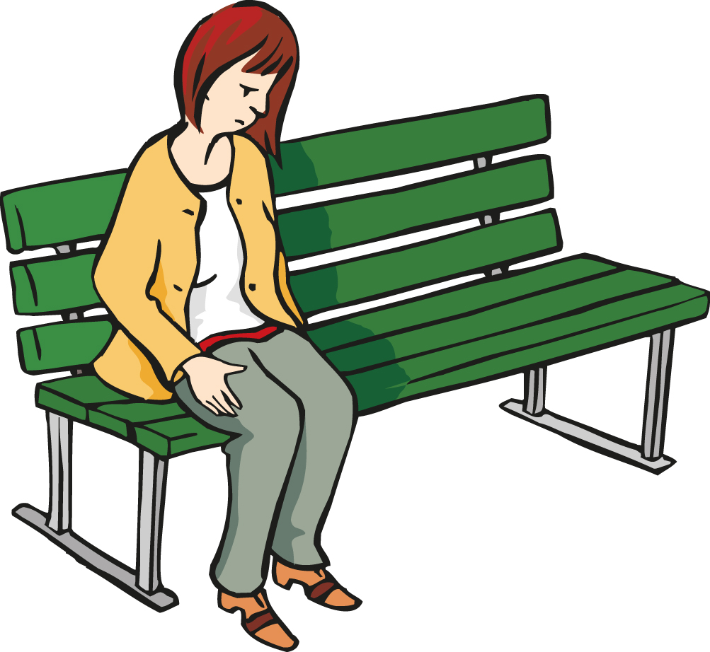 Mädchen sitzt auf der Bank
